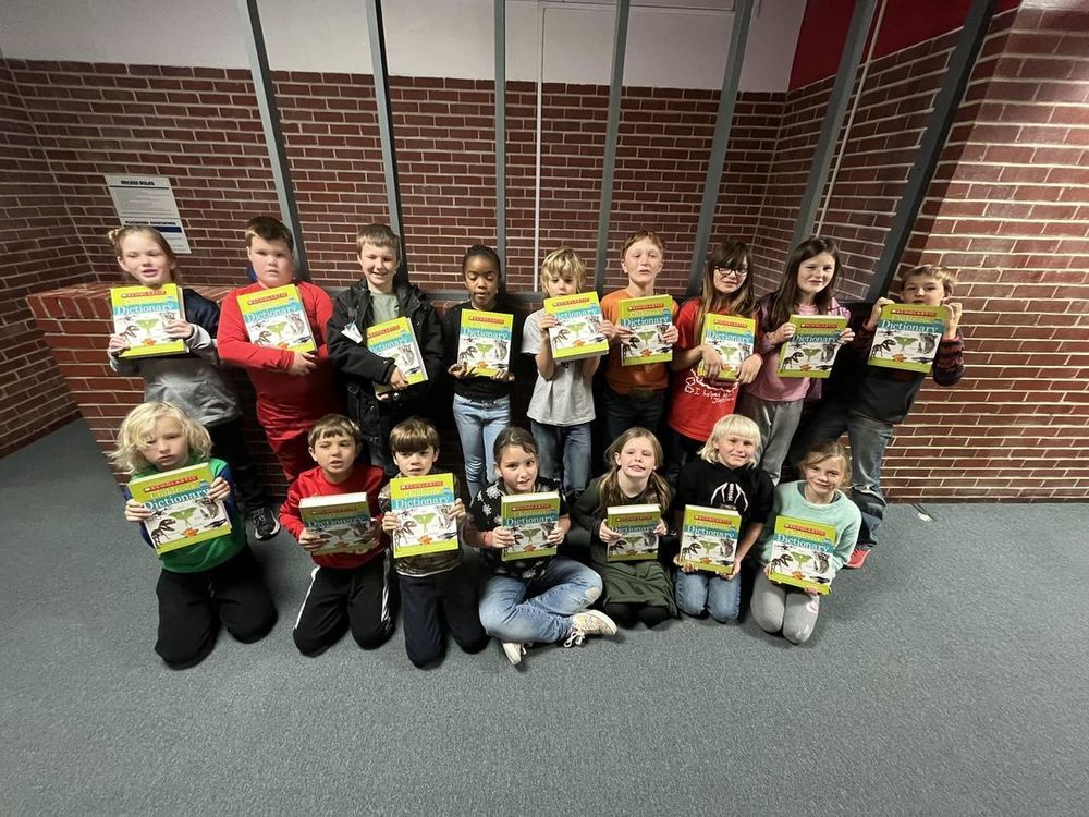 3rd Grade Students with New Dictionaries